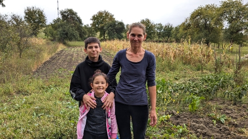 Alin with his sister and mother