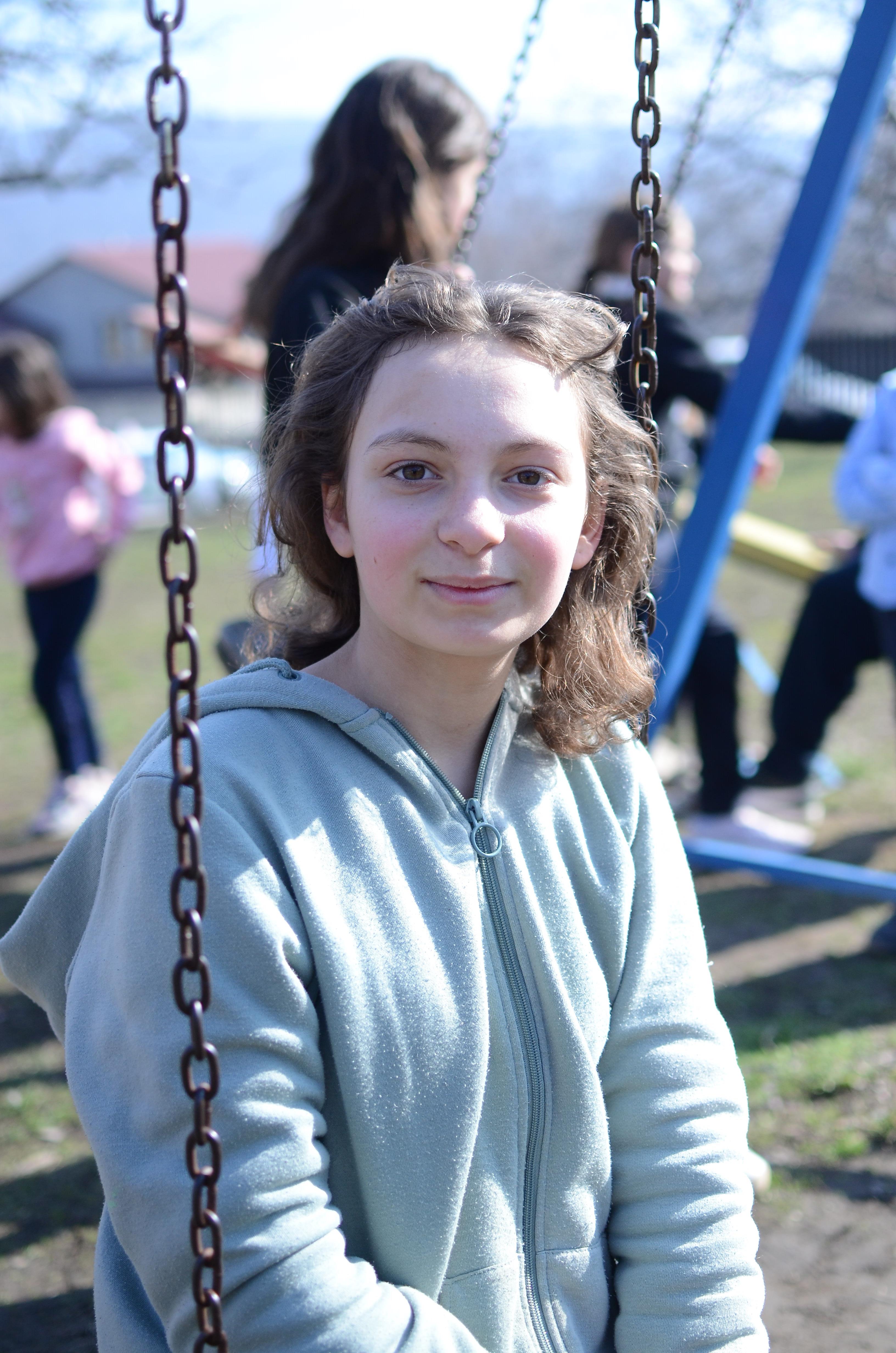 Claudia playing outside at after school program